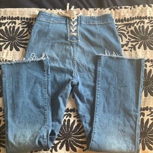 Mother lace up jeans